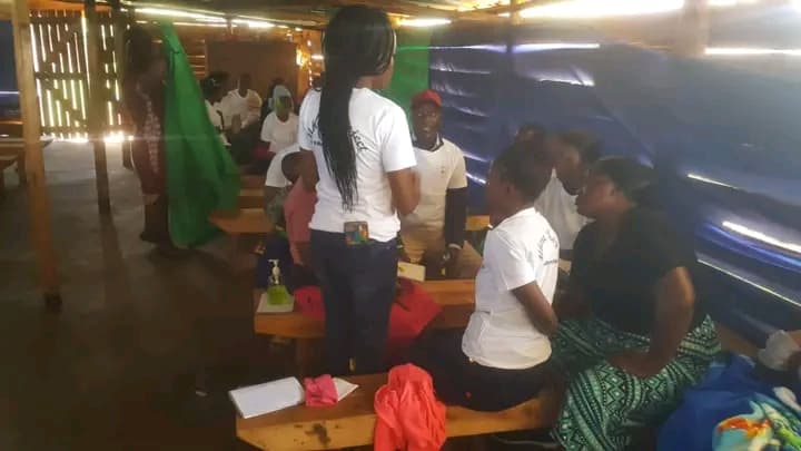 Mhare Project awareness session under a community tent